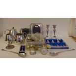 Silver plated items: to include photograph frames; flatware; and a pair of candlesticks  7"h