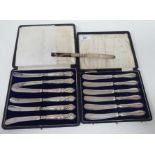 Two sets of six loaded silver handled butter knives  both boxed; and one single  mixed marks
