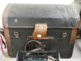 An early 20thC hide bound canvas cabin trunk with a domed lid and straight sides and a removable