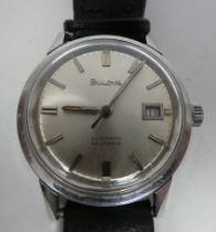 A Bulova stainless steel cased automatic wristwatch, faced by a baton dial with a date aperture,