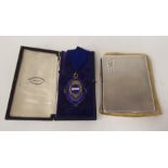 A silver cigarette case; and a silver medal, awarded to one AE Millard Esq, former President of