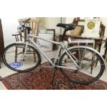 A Marin Alloy framed bicycle with Shimano gears and 27"dia wheels