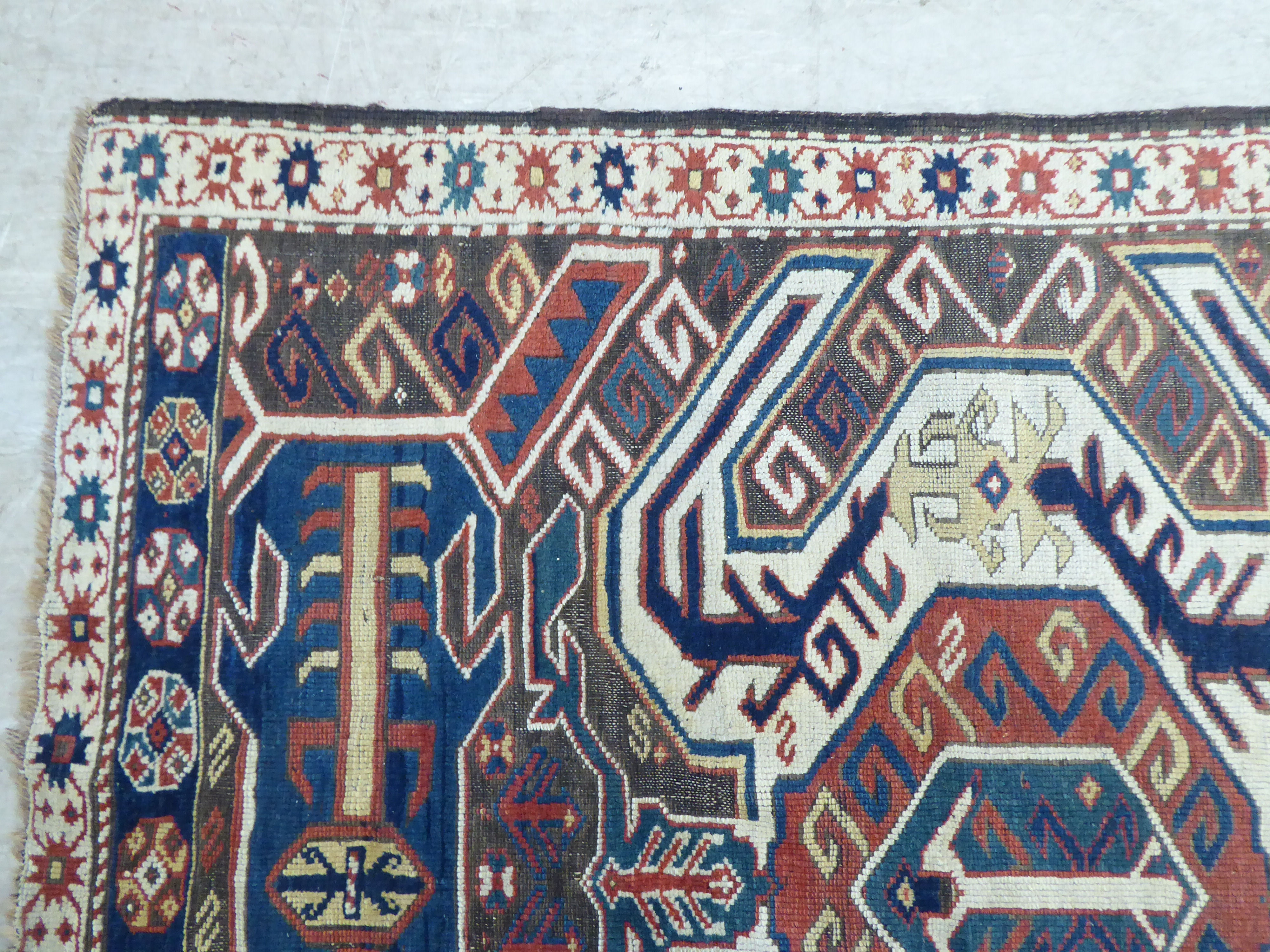 A Turkish Kilim style runner, decorated with repeating stylised designs, on a multi-coloured ground - Image 3 of 4