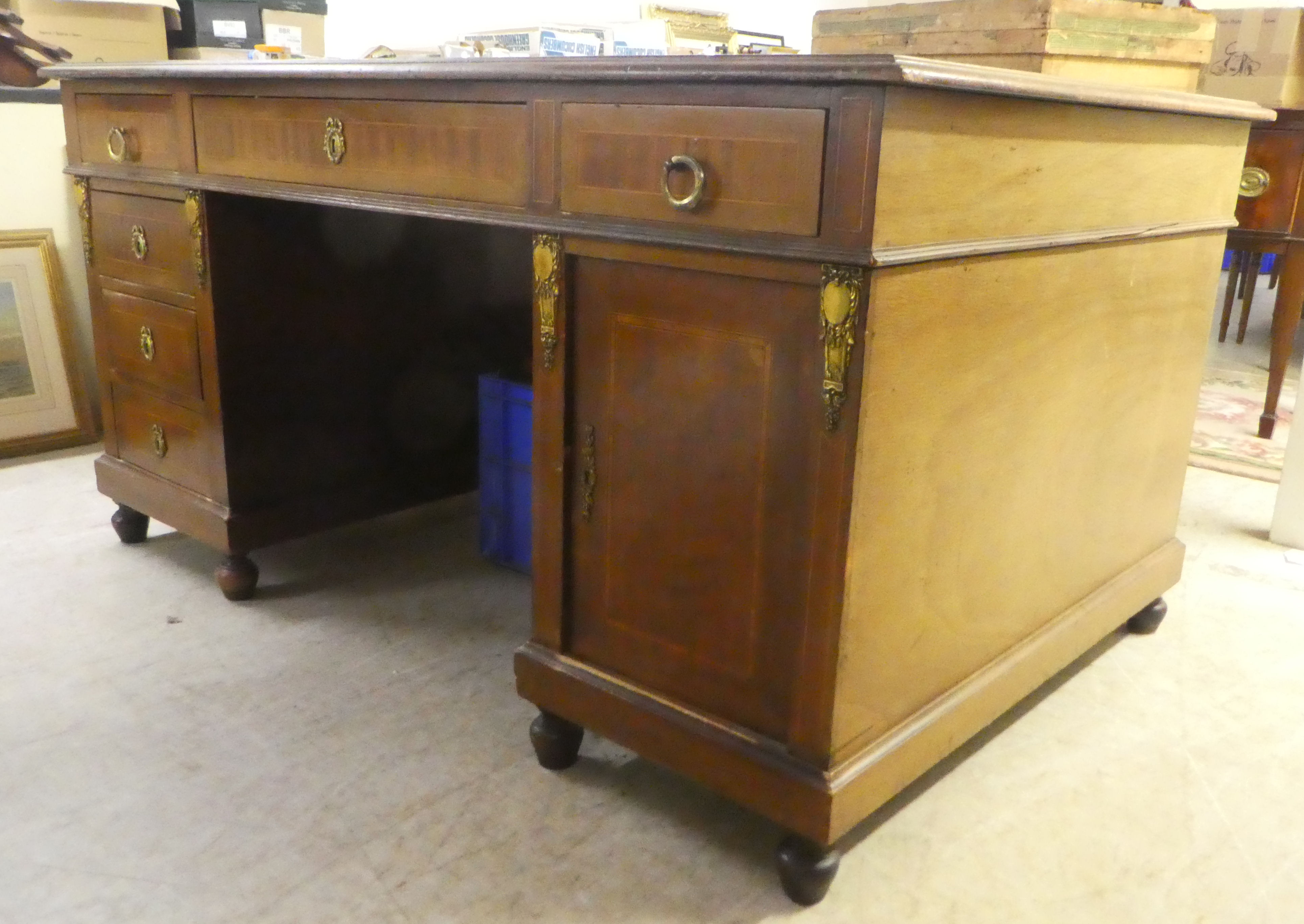 An early 20thC string inlaid mahogany, twin pedestal partner's desk with an arrangement of drawers - Image 2 of 6