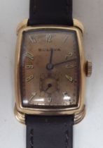 A Bulova gold plated on stainless steel wristwatch, faced by an Arabic dial with subsidiary seconds,