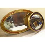 Two modern mirrors, the oval plates in moulded gilt frames  18" x 22" and 20" x 31"