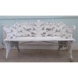 A modern Coalbrookdale style painted aluminium garden bench, raised on scrolled legs