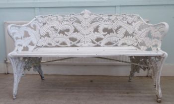 A modern Coalbrookdale style painted aluminium garden bench, raised on scrolled legs