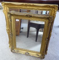 Two similar modern mirrors, in moulded gilt frames  21" x 26" and 30" x 25"