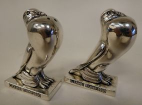A pair of white metal novelty Art Deco inspired condiments pots, fashioned as fantail doves