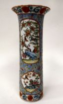 A late 19thC Chinese porcelain vase of cylindrical form, decorated with panels of flora, birds and