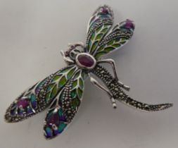 A white metal plique-a-jour dragonfly brooch