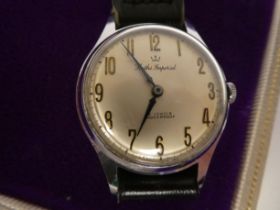A Smith Imperial stainless steel cased wristwatch, faced by an Arabic dial, on a black hide strap