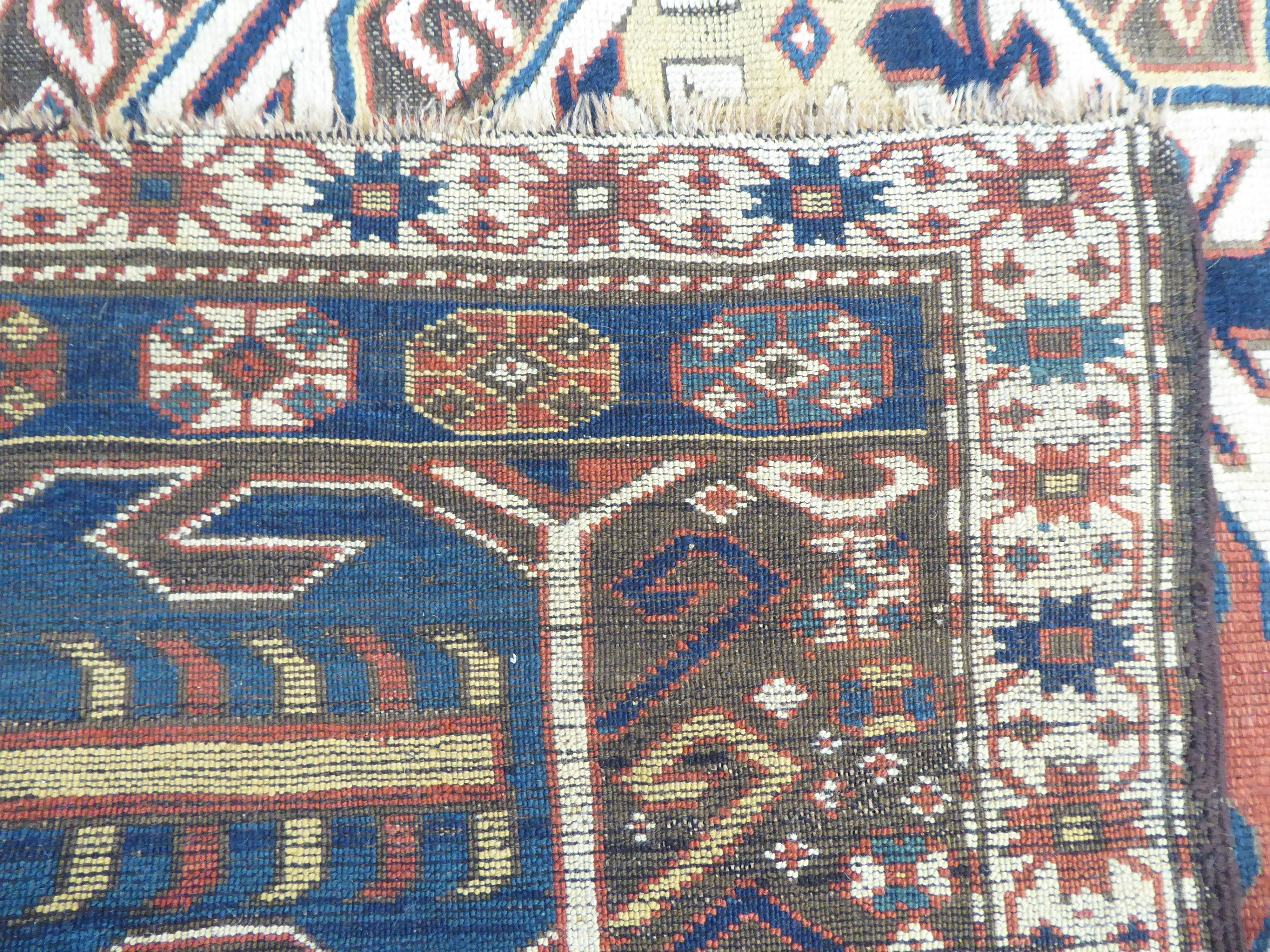 A Turkish Kilim style runner, decorated with repeating stylised designs, on a multi-coloured ground - Image 4 of 4