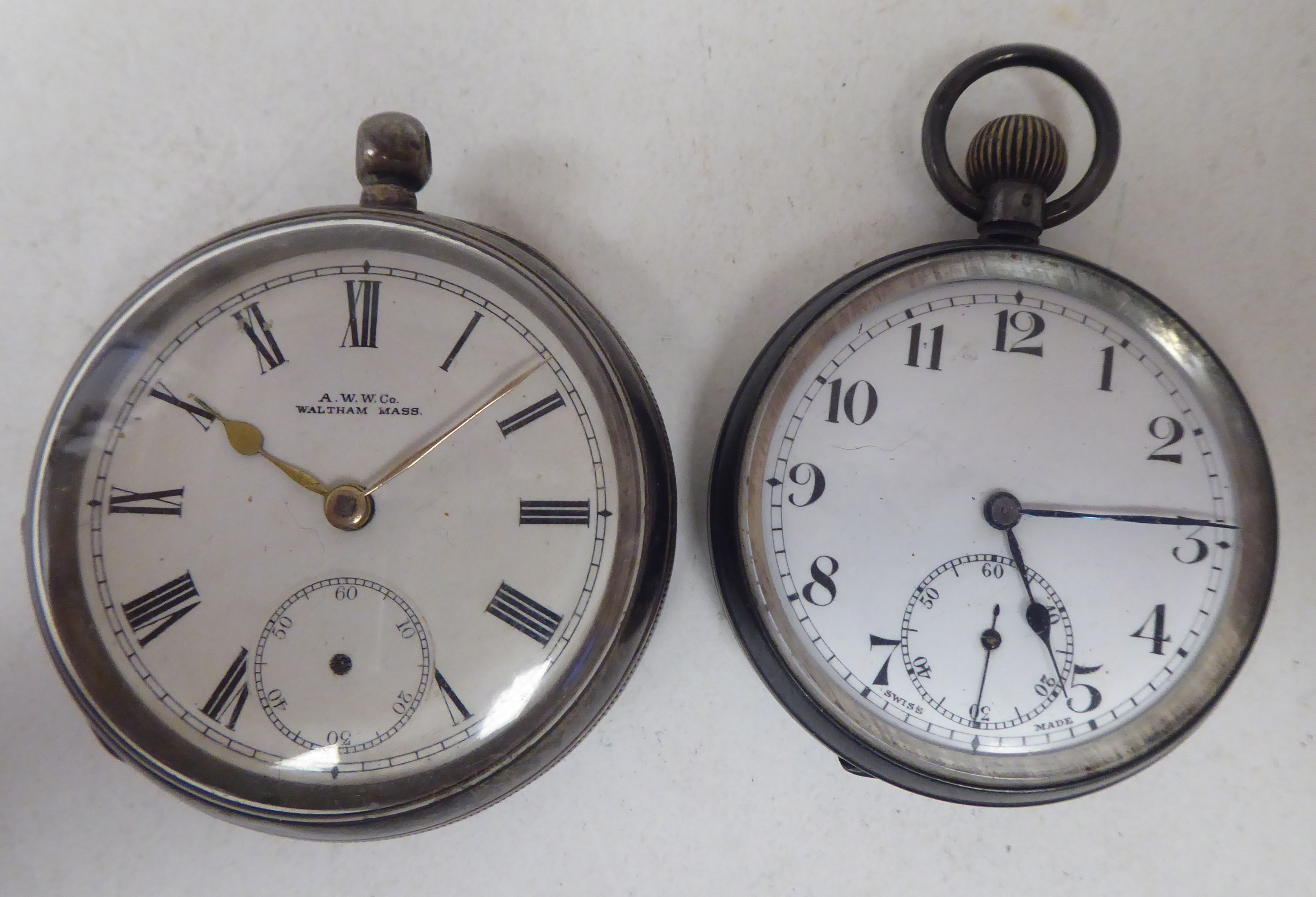 A Waltham silver cased pocketwatch, faced by a Roman dial; and another, faced by an Arabic dial