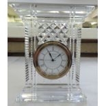 A Waterford crystal cased pillar design mantel clock  7"h