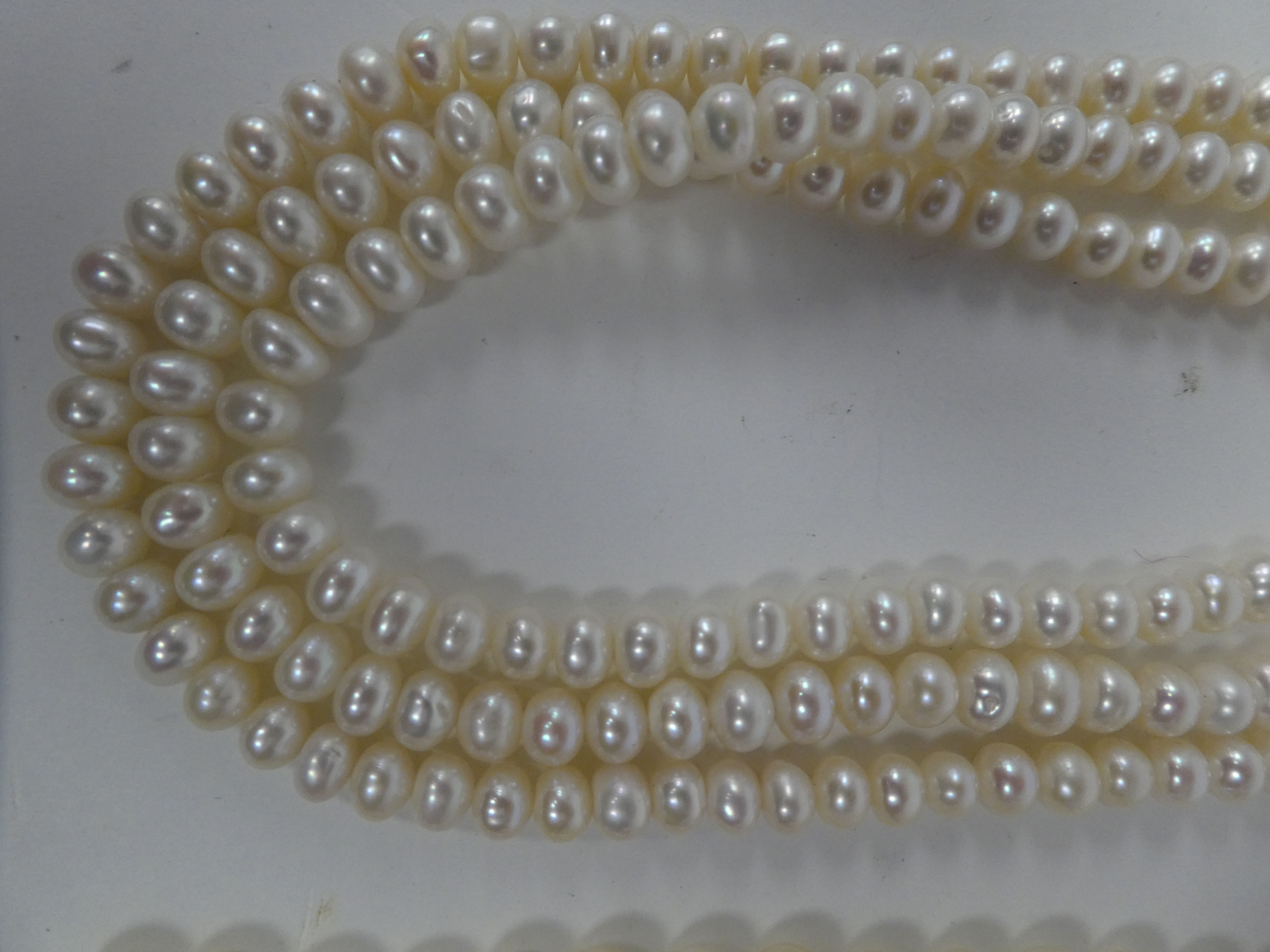 A triple string pearl necklace; and another single strand example, both on 9ct gold clasps - Image 2 of 3