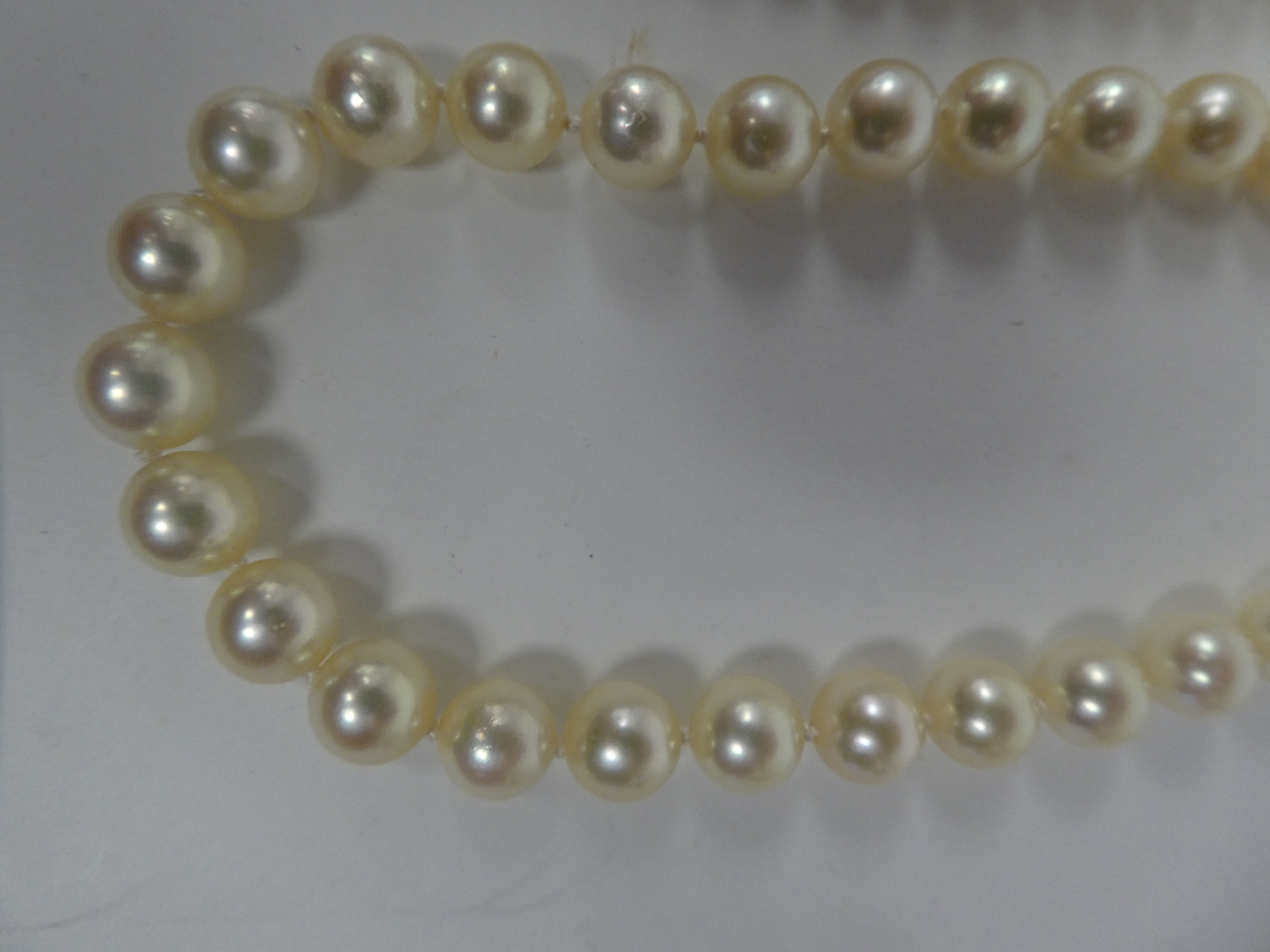 A triple string pearl necklace; and another single strand example, both on 9ct gold clasps - Image 3 of 3