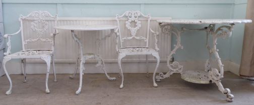 Modern white painted aluminium garden furniture: to include a table, raised on splayed legs  29"h