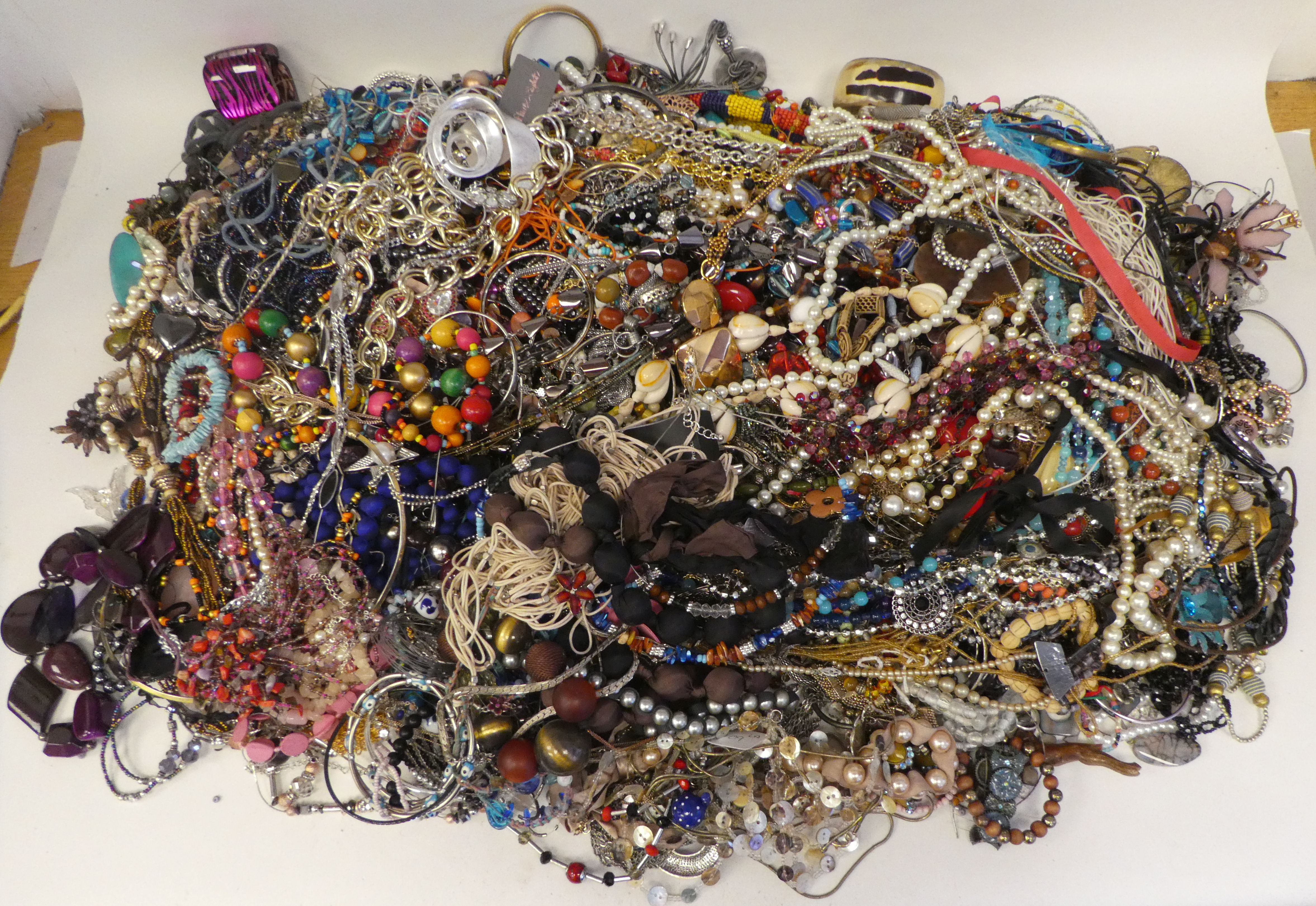 Costume jewellery, mainly bangles and bracelets, simulated pearls and other necklaces