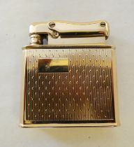 A 1952 Colibri Monopol gold plated cigarette lighter