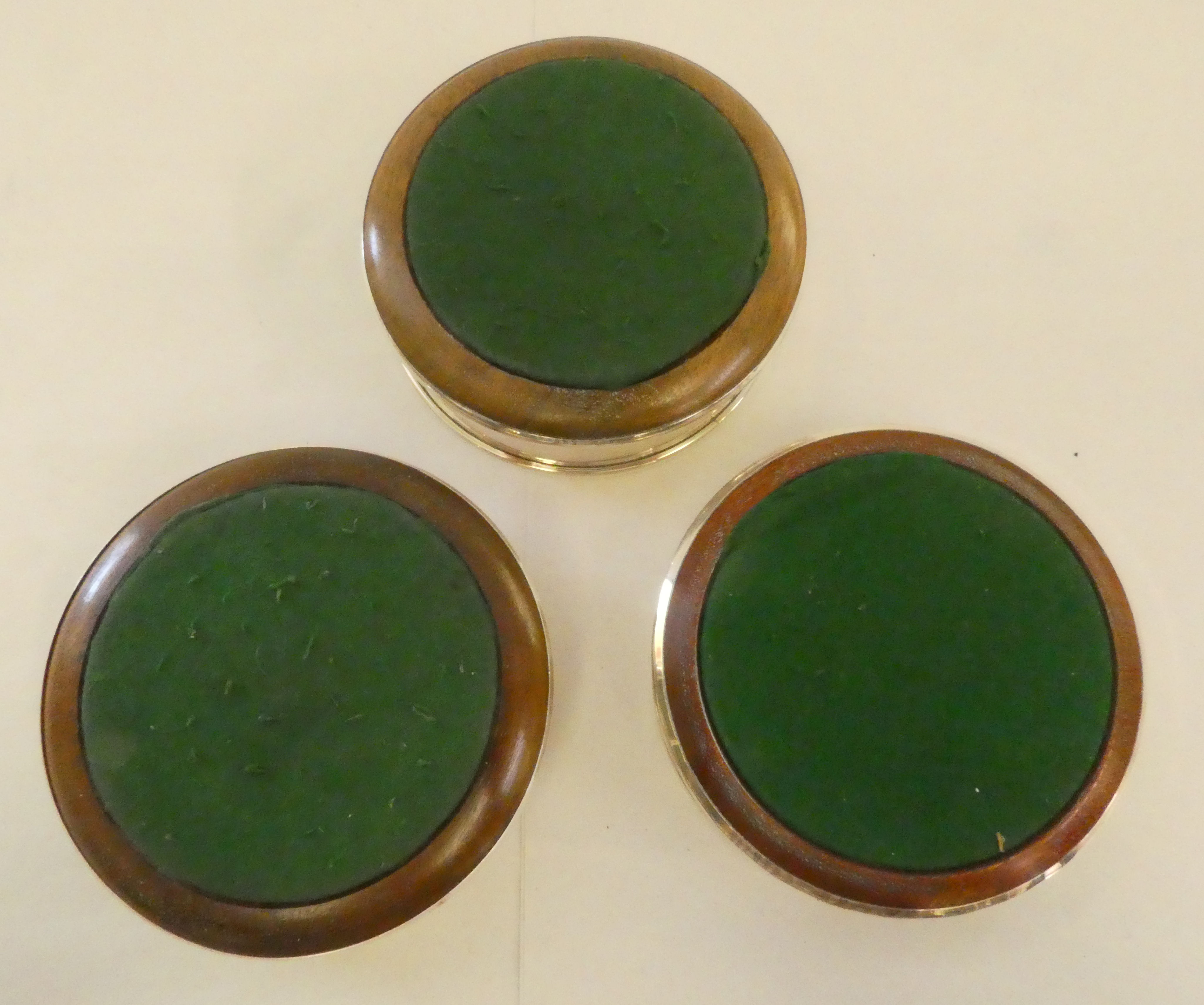 A matched set of three silver coasters with wooden bases  mixed marks  5"dia - Image 5 of 5