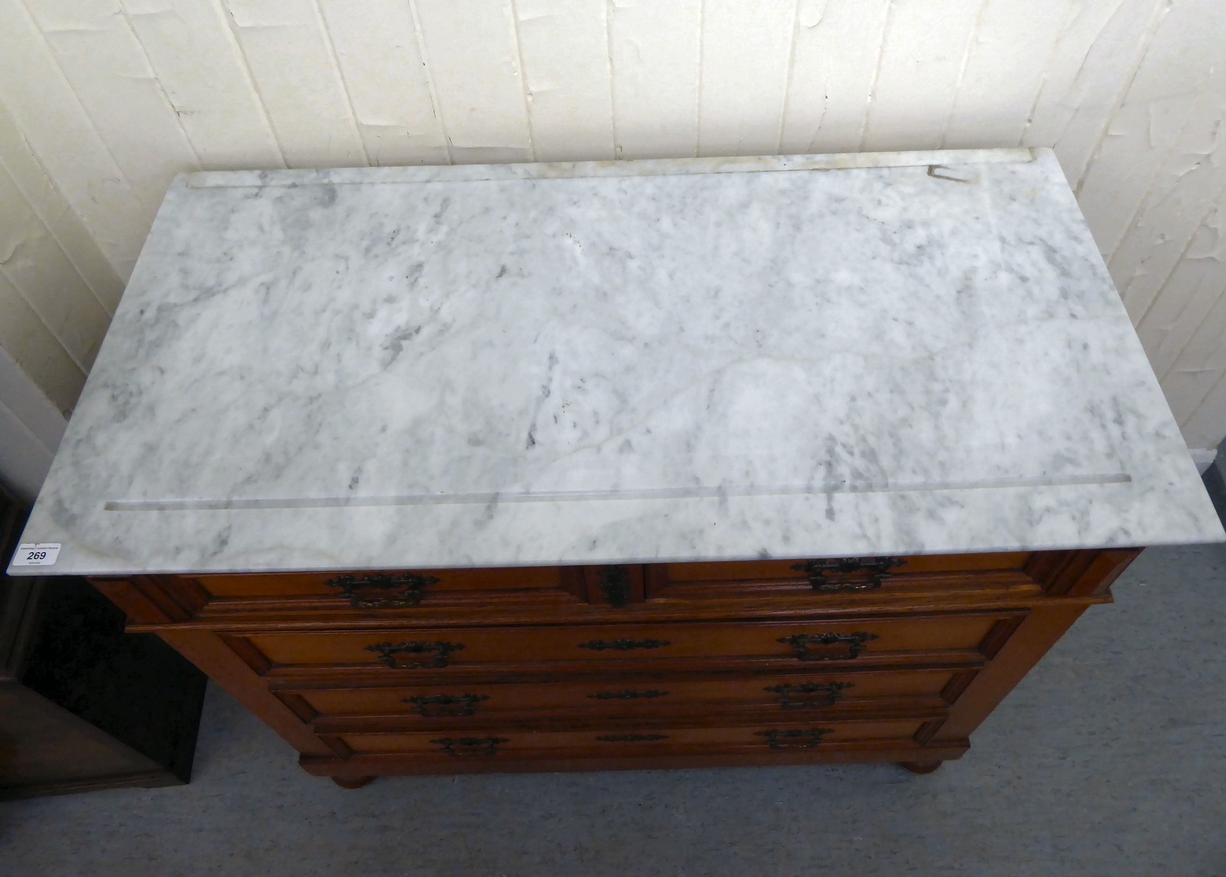 An early/mid 20thC oak commode, the fixed grey/white marble top, over two short/three long - Image 3 of 6