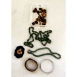 Items of personal ornament: to include jade coloured beads; and a 9ct gold heart shaped pendant