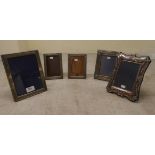 Five silver mounted photograph frames, each on an easel back  mixed marks  largest 8" x 6"