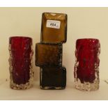 Whitefriars glassware, viz. a brown Drunken Bricklayers vase  8.5"h; and two red knobbly cylindrical