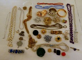 Items of personal ornament: to include brooches; a keeper ring; faux pearls and other bead necklaces