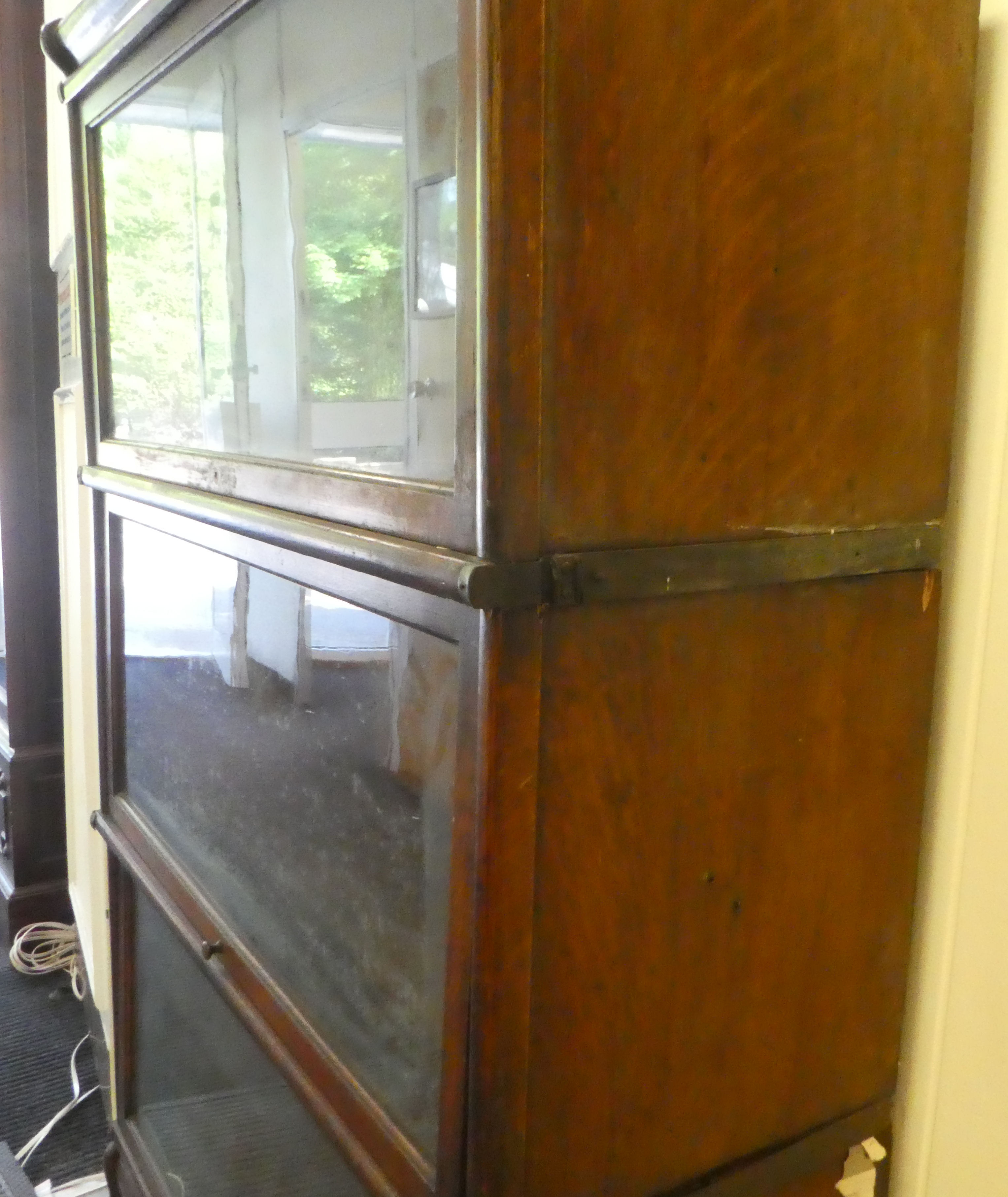 A 1920s/30s oak matched and adapted three section bookcase with lift and slide doors and a base - Image 3 of 5