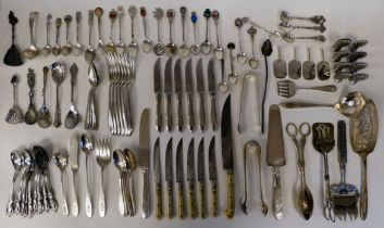 Novelty place settings; and a miscellany of variously patterned cutlery and flatware, some white