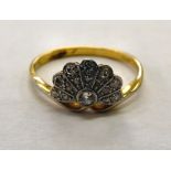 An 18ct gold diamond peacock fan design ring