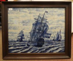 A framed group of twenty modern Delft inspired blue and white pottery tiles, depicting galleons at