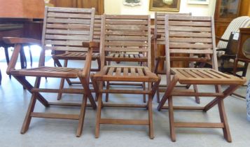 A set of six modern stained teak framed folding terrace chairs with slatted backs and seats