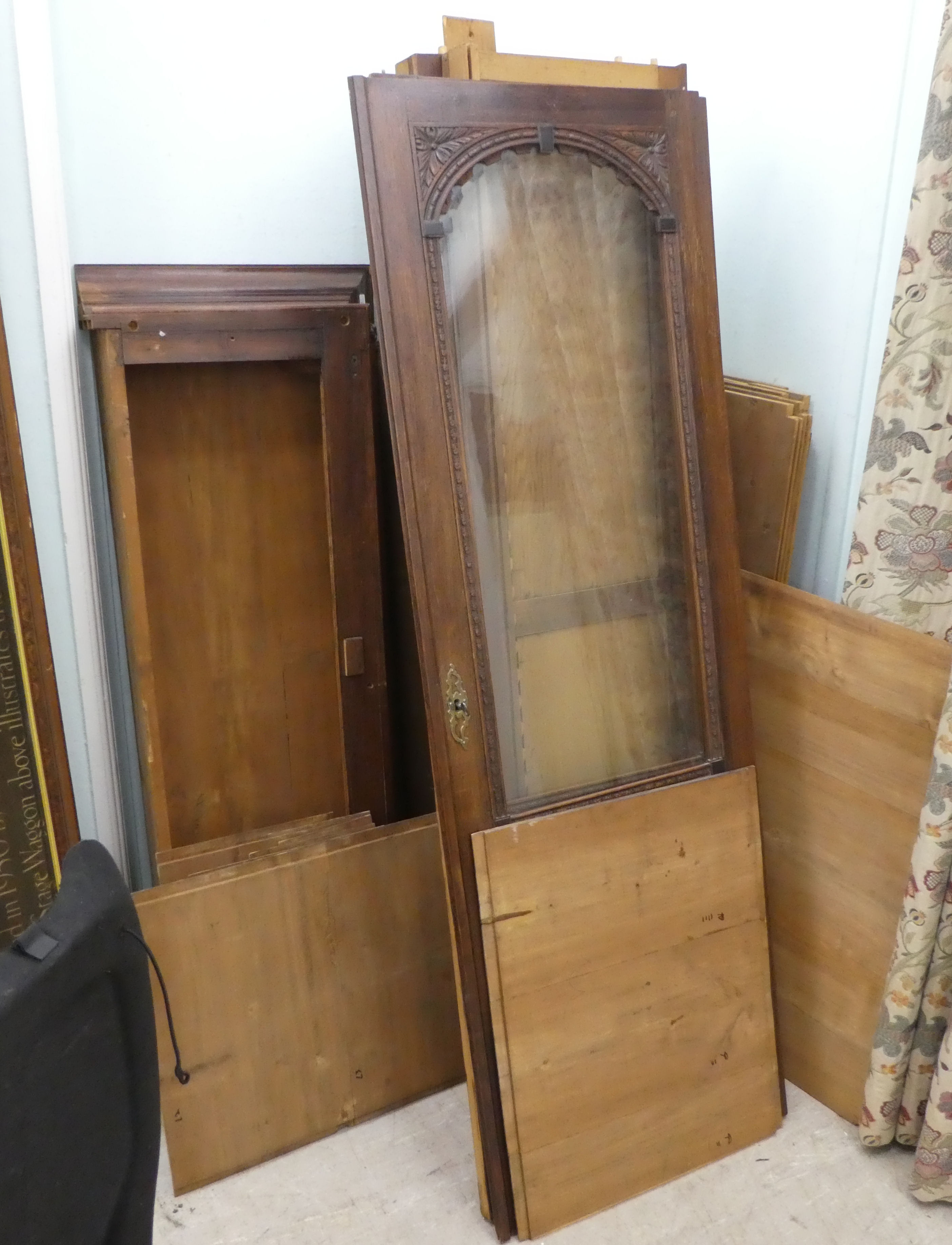 A late Victorian carved and glazed panelled oak twin door bookcase, on a plinth  84"h  56"w - Image 2 of 3