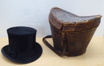 A late Victorian black silk top hat  6.25"side to side  7.75"front to back