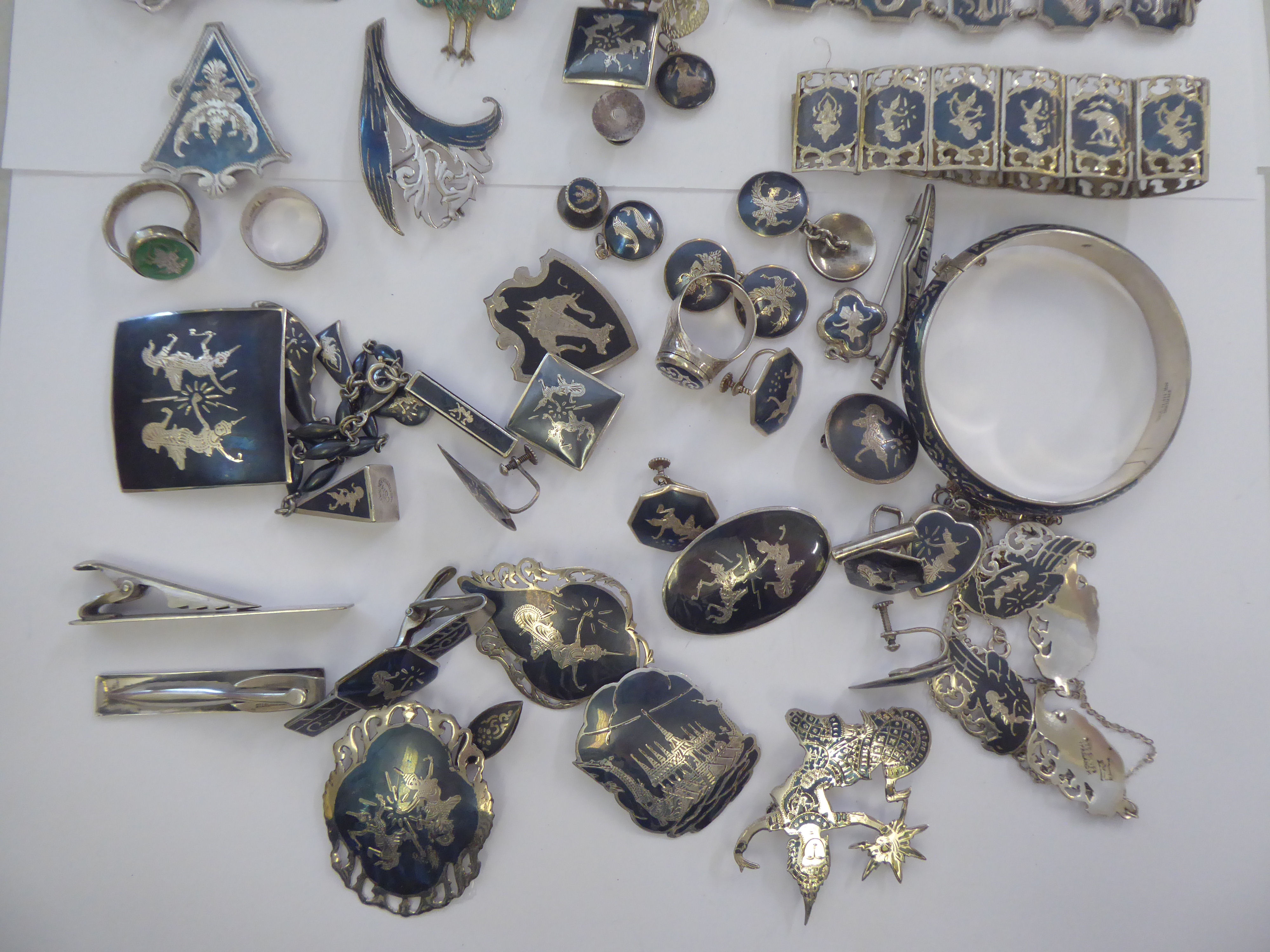 Modern Asian silver coloured metal and variously decorated items of personal ornament: to include - Image 3 of 3