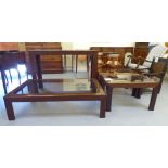 A suite of modern mahogany furniture, all with glass inserts, raised on square legs, viz. a hall