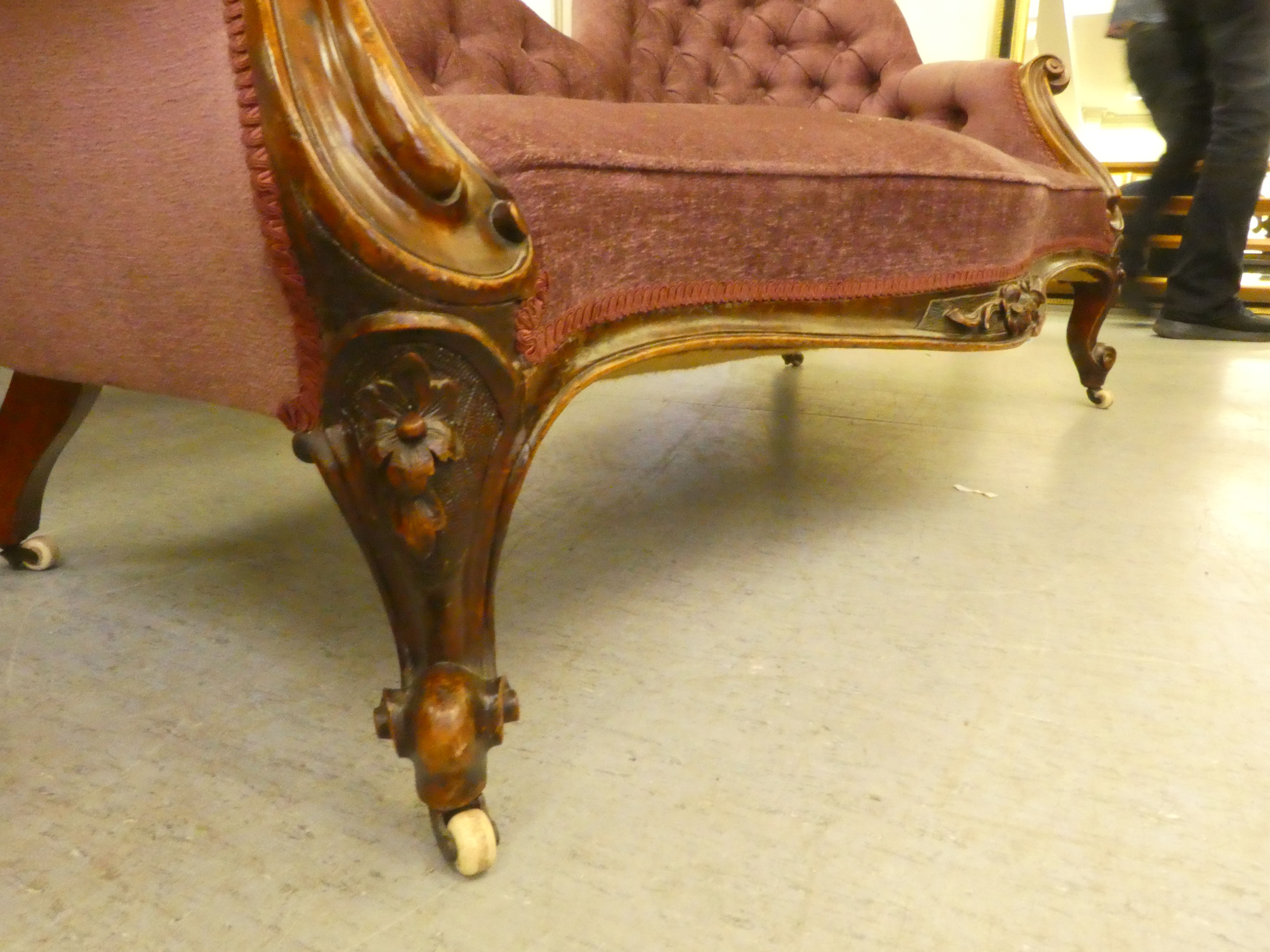 A mid Victorian scroll carved mahogany showwood framed, double spoonback settee, part button - Image 5 of 5