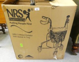 An NRS three wheeled rollator with a basket and tray  boxed