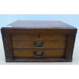 A matched silver plated, variously patterned Harrods and other oak chest canteen of cutlery and