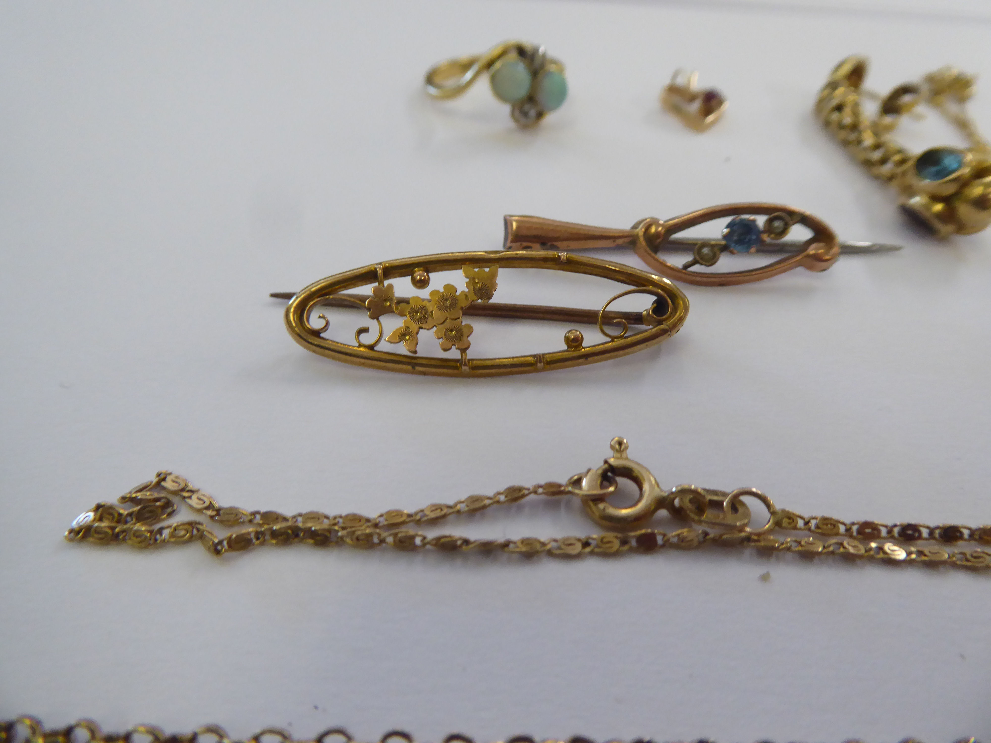 Items of personal ornament: to include two bar brooches and a pendant on a fine chain - Image 3 of 3