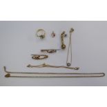 Items of personal ornament: to include two bar brooches and a pendant on a fine chain