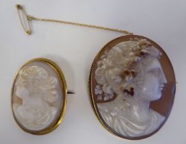 A yellow metal cameo brooch, depicting a profile portrait, a young lady with flowers in her hair