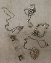 A mixed lot: to include a white metal teardrop design pendant scent bottle