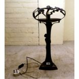 A modern Art Nouveau design patinated metal table lamp, the column incorporating a female figure