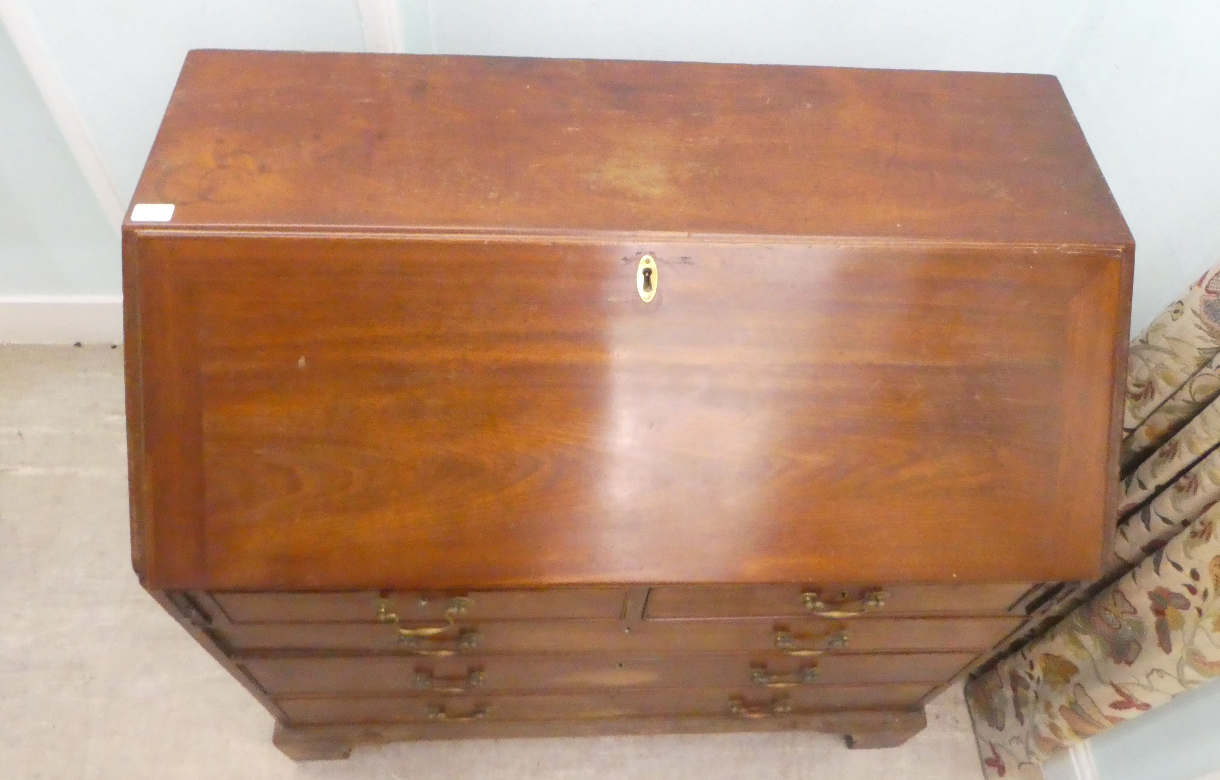 A 19thC mahogany bureau, the fall flap over two short/three graduated long drawers, raised on - Image 4 of 6