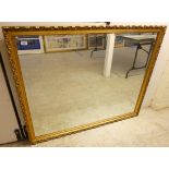 A modern mirror, the bevelled plate set in a moulded gilt frame  40" x 51"